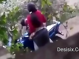 Desi couple standing nail in forest